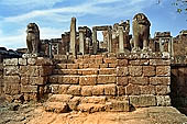 Angkor - Eastern Mebon - towered passageways leading to the first enclosure of the temple,  with stone lions guarding the entrance.